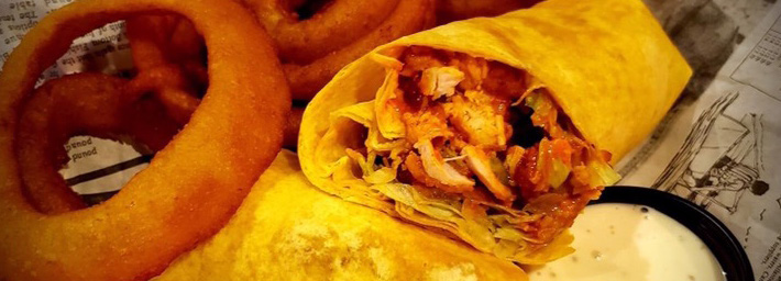 Buffalo chicken wrap with onion rings